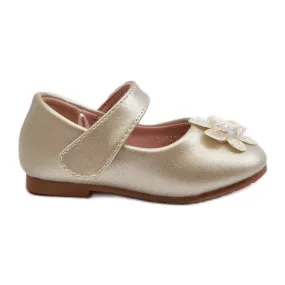 Children's ballerina shoes fastened with Velcro and gold serinde decoration golden