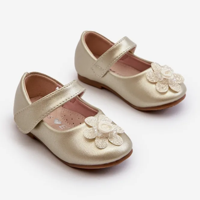 Children's ballerina shoes fastened with Velcro and gold serinde decoration golden